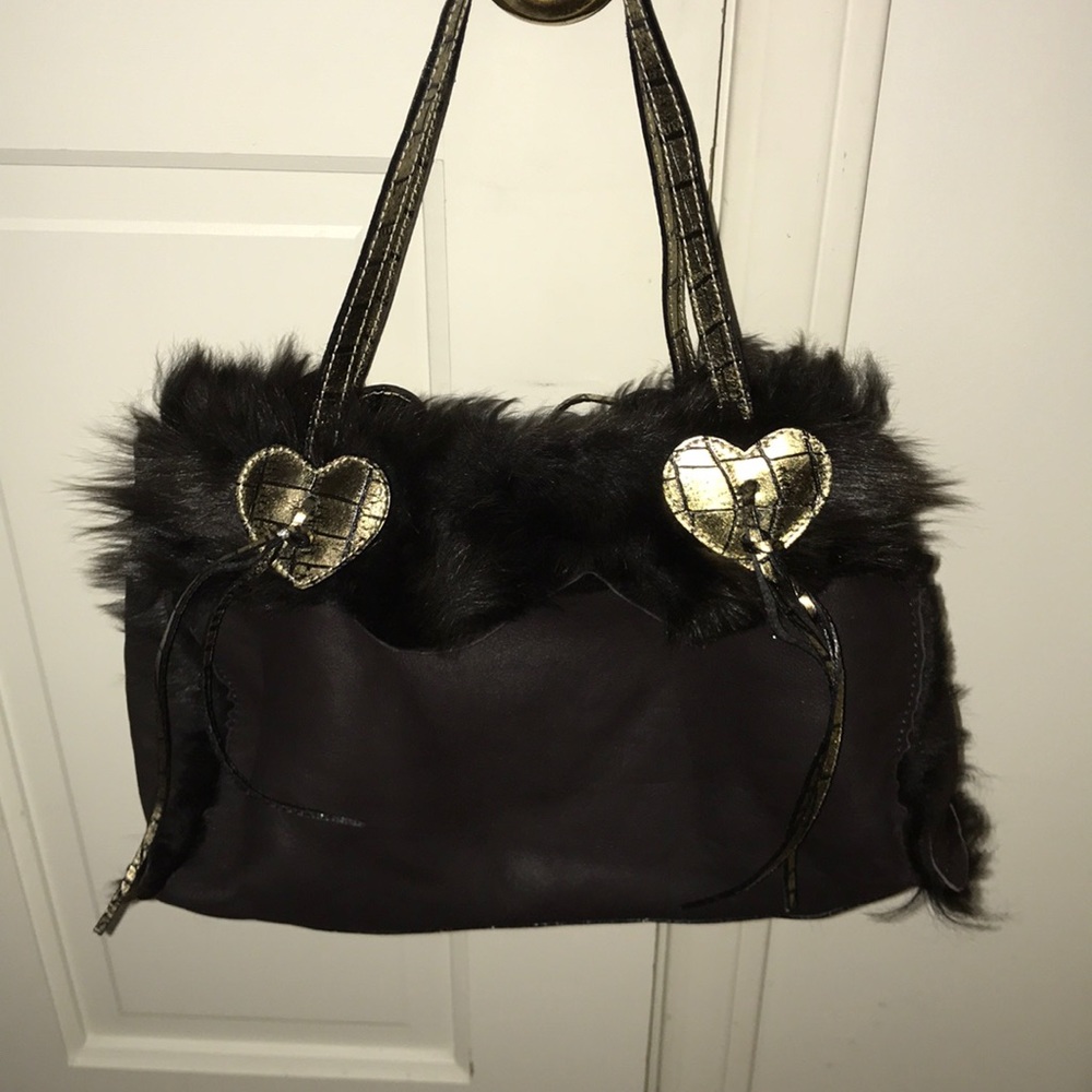 Genuine Leather and lined real fur. made in Italy